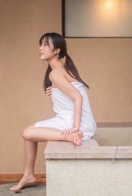 Tender girl playing in the water